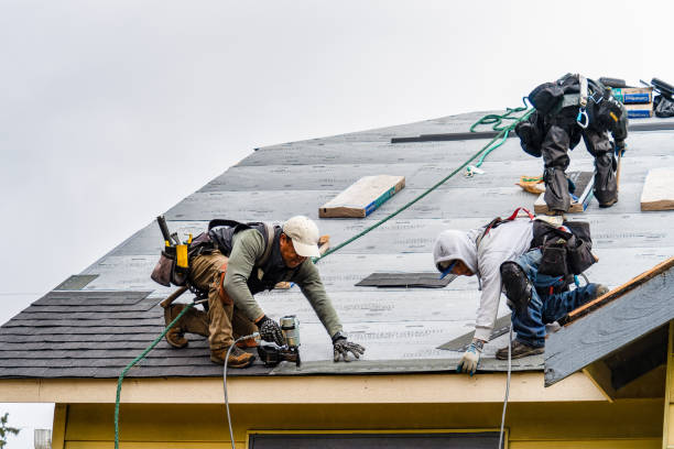 Professional Gutter Installation technician working in Sharon, ND